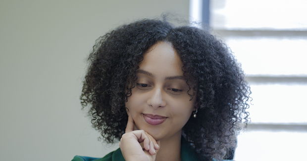 A colleague at work in the firm&rsquo;s Accra office